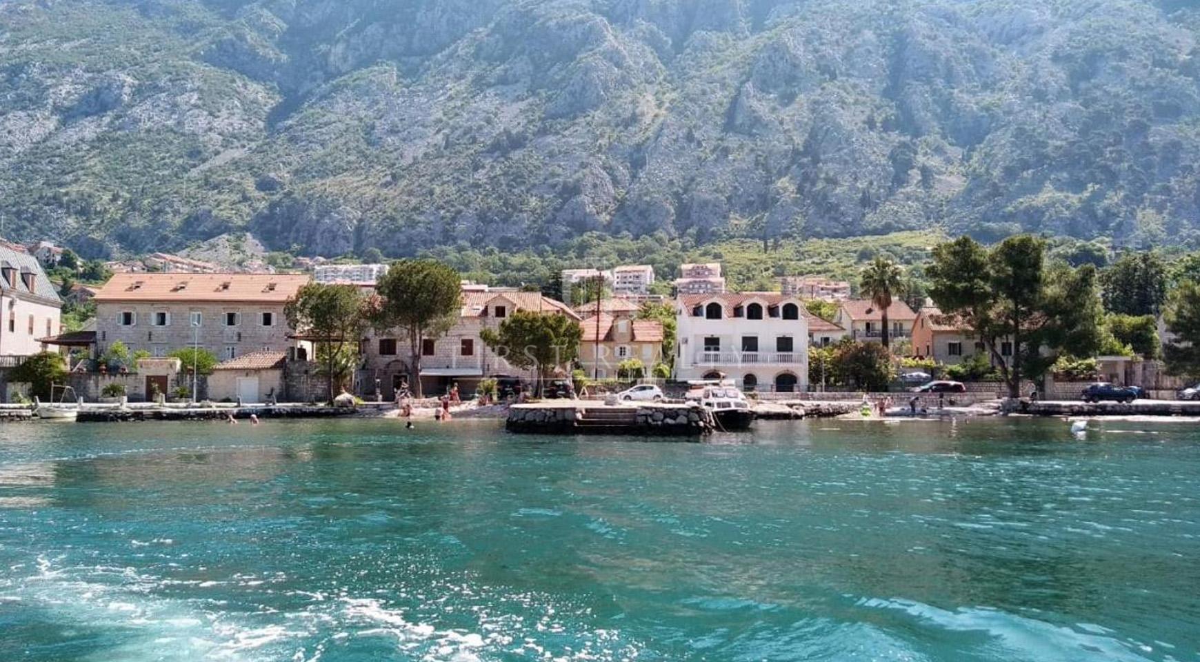 Ancient mansion on the first line with a large plot